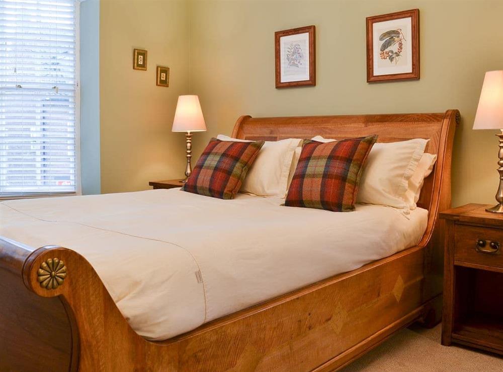 Wonderful elegant sleigh bed in the master bedroom at Princess Lodge in Scarborough, Yorkshire, North Yorkshire