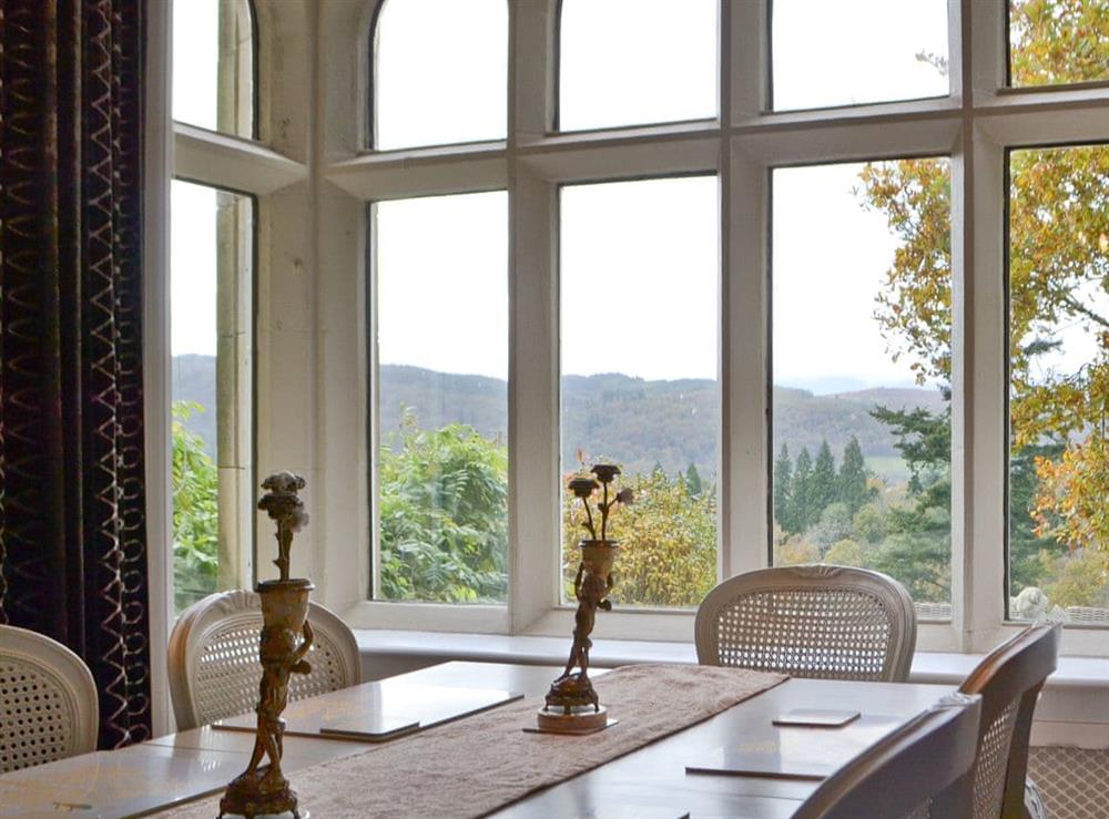 Dining area with wonderful window views (photo 2) at Priory Manor in Windermere, Cumbria