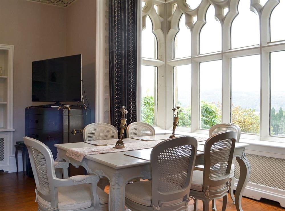 Dining area with wonderful window views at Priory Manor in Windermere, Cumbria