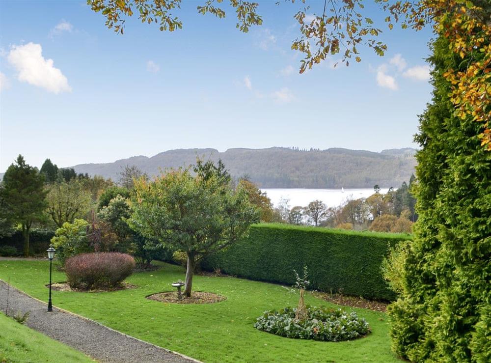 Garden area looking out to Lake Windermere at Priory Manor in Windermere, Cumbria
