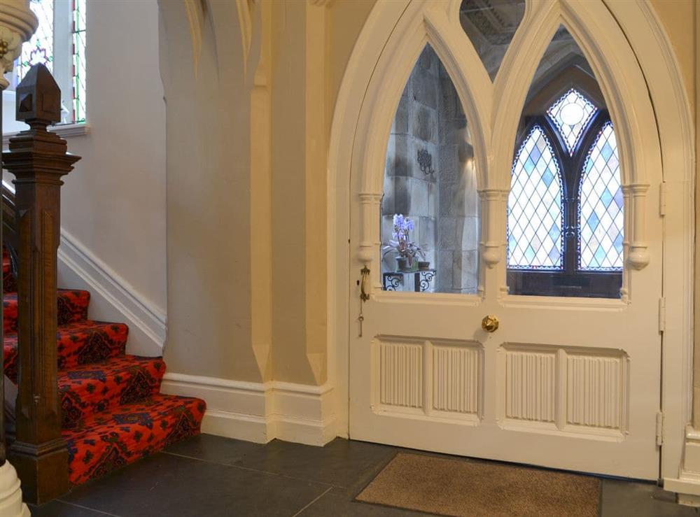 Impressive Gothic entrance with stained glass windows