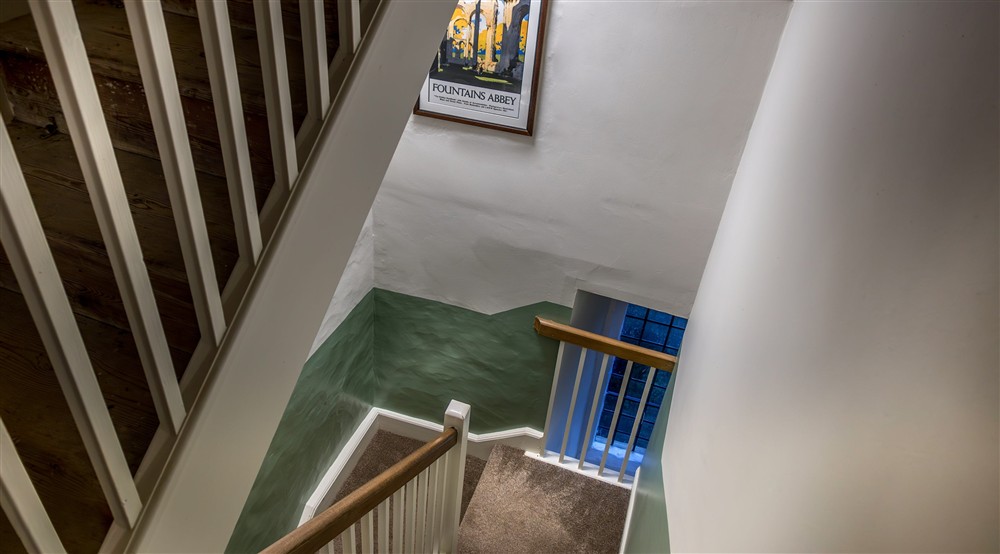 The staircase leading up to the Proctor apartment, North Yorkshire at Proctor in Ripon, North Yorkshire