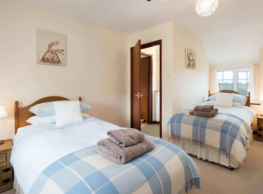 Light and airy twin bedroom at Dunstanburgh View, 