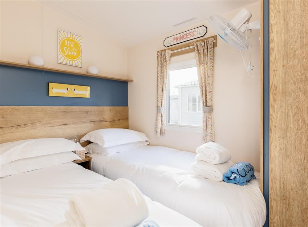 Twin bedroom at Prosecco Palace in Poole, Dorset