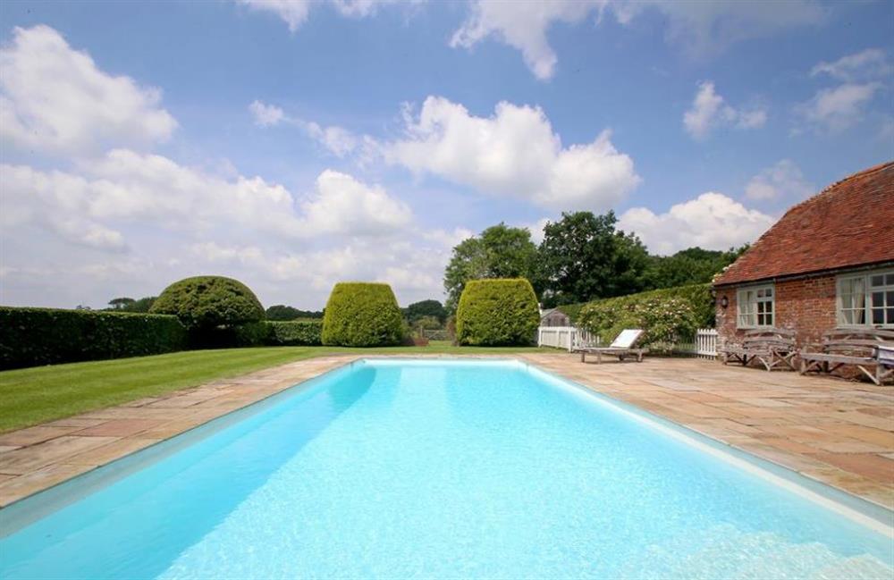 The swimming pool and lawned garden at Prospect Cottage, Wittersham, Kent