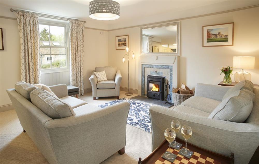 Sitting room with wood burning stove at Prospect House, Ampleforth