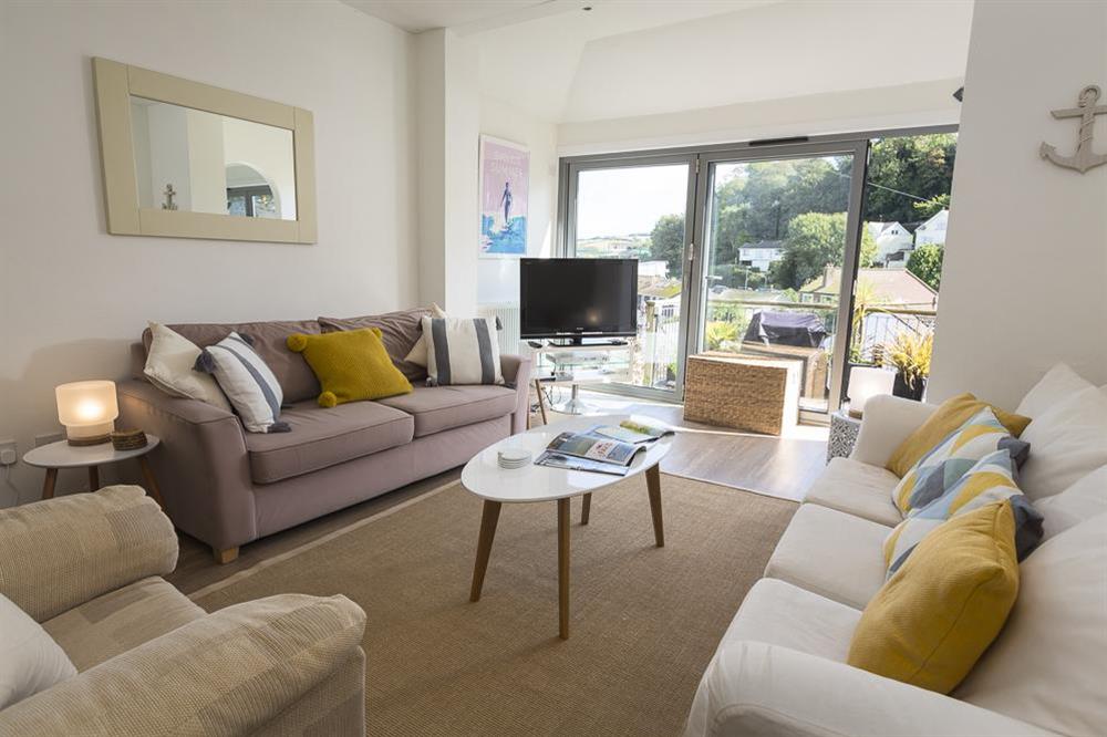 Cosy sitting room with doors out to the decking at Prospects in , Salcombe