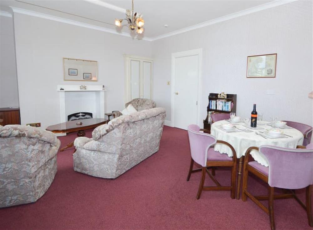 Living room/dining room at Protea Cottage in Torquay, South Devon