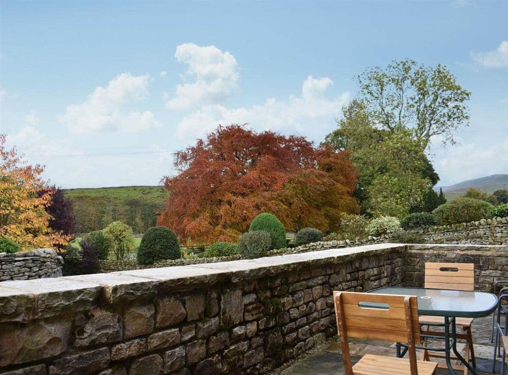 Private courtyard with table and chairs