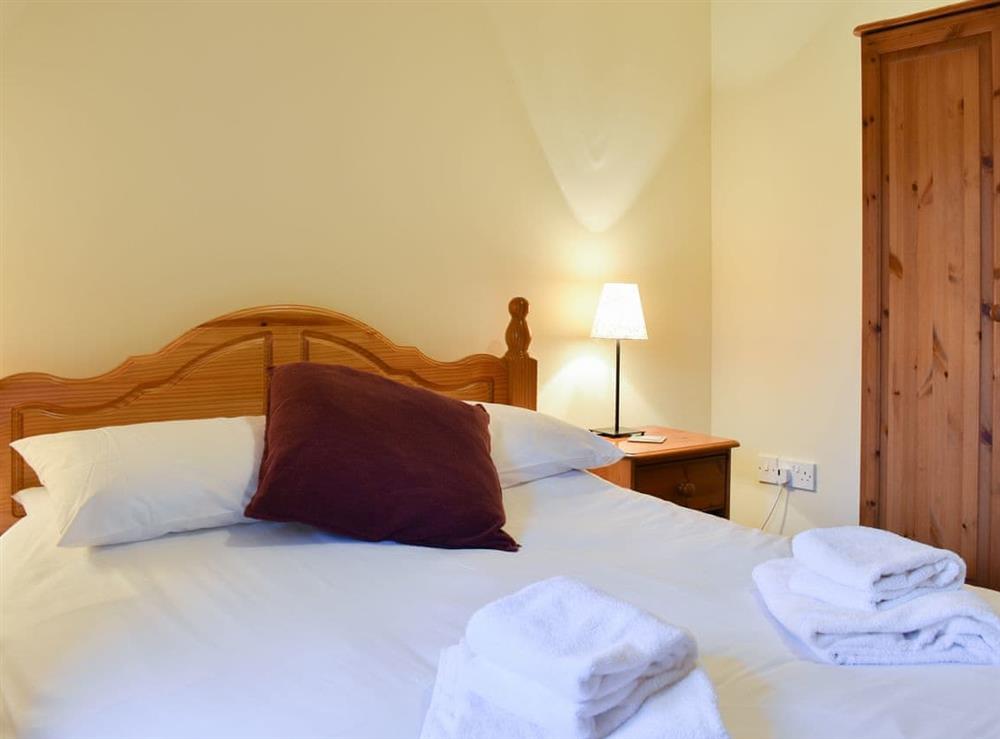 Warm and inviting double bedded room at The Stable, 