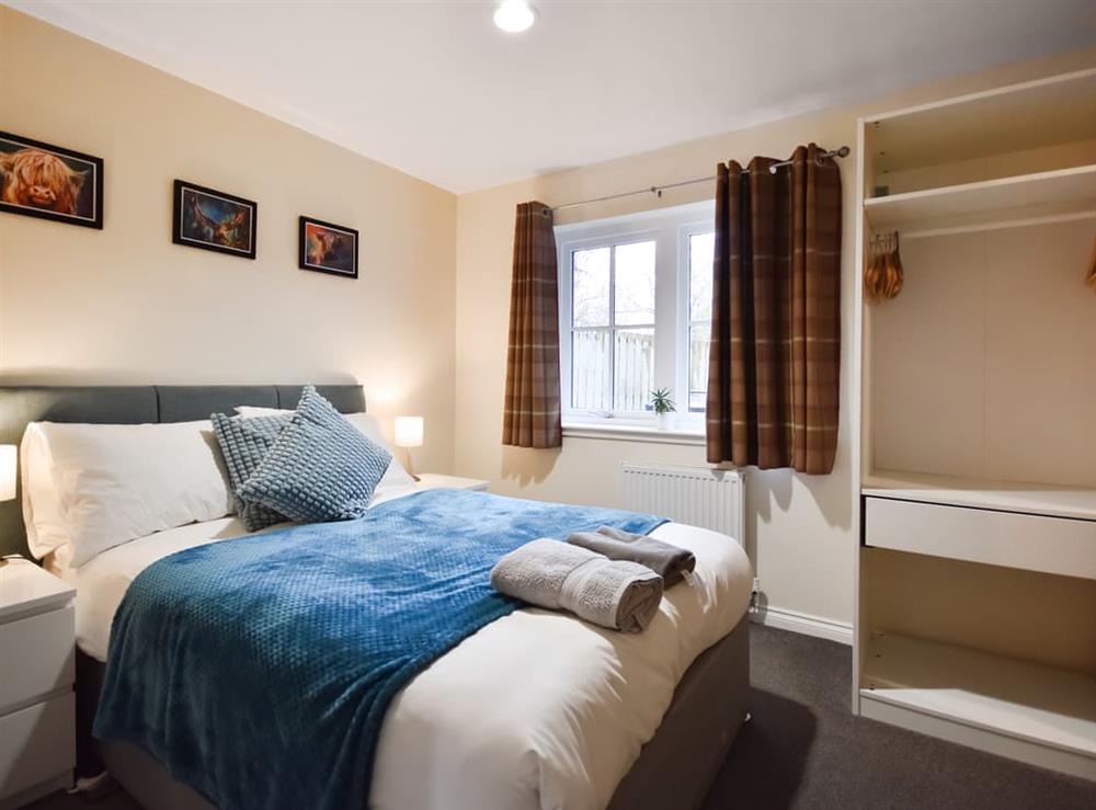 Double bedroom at Ptarmigan Lodge in Balmaha, Lanarkshire
