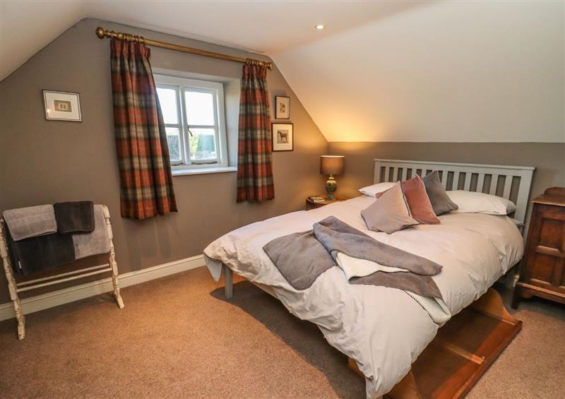This is a bedroom at Pudding Hill Barn Cottage, Arlington near Fairford