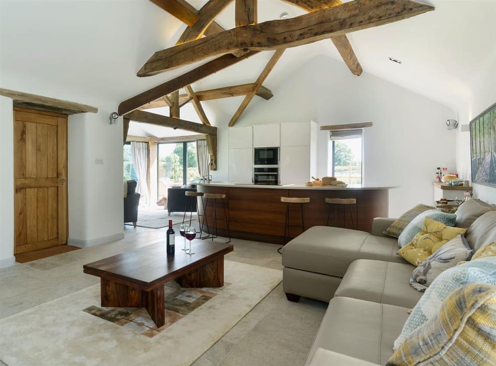 Superbly renovated open plan living space with beams at Puddledock Piggery in Berkley, near Frome, Somerset
