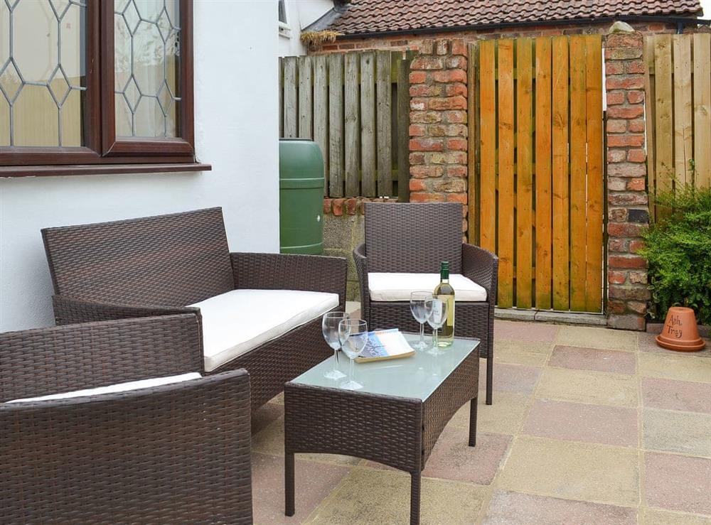Patio at Puffin Cottage in Buckton, near Bridlington, North Humberside