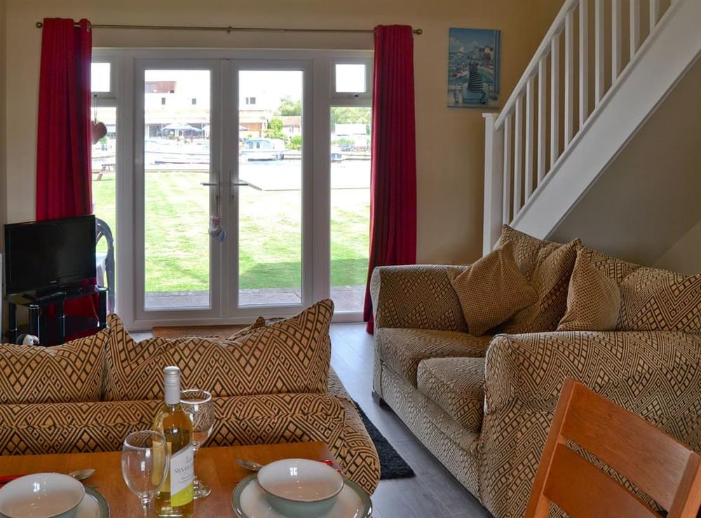 Open plan living space at Puffin Cottage in Wroxham, Norfolk