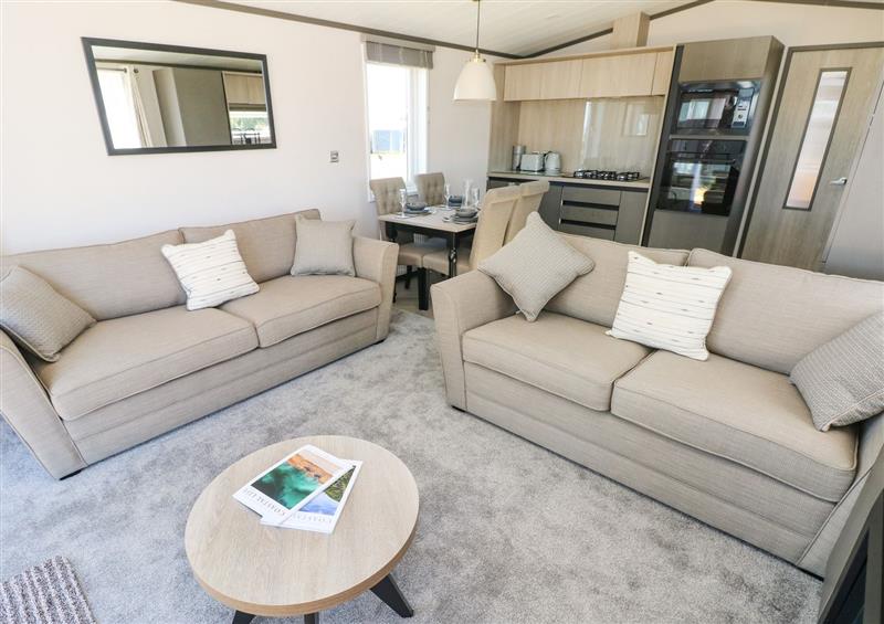 Enjoy the living room at Puffin Lodge, Hasguard Cross near Broad Haven