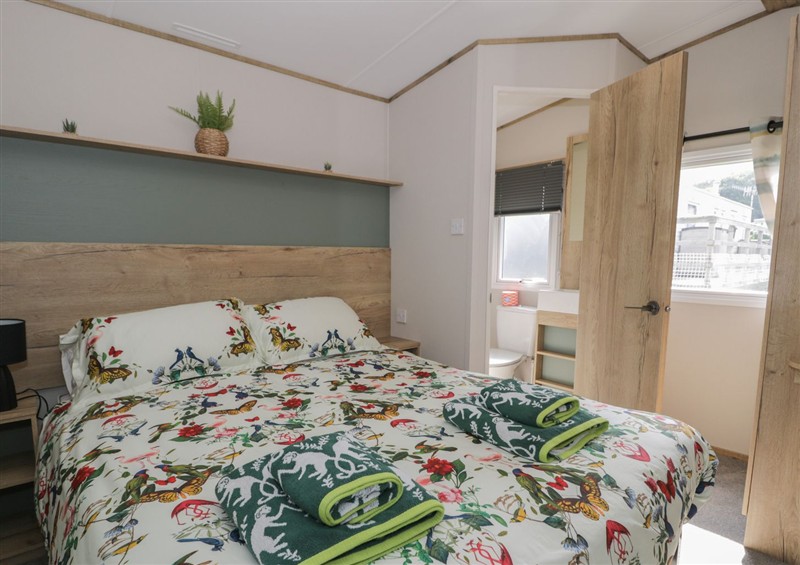 One of the bedrooms at Puffin Way Holiday Caravan, Llwyngwril