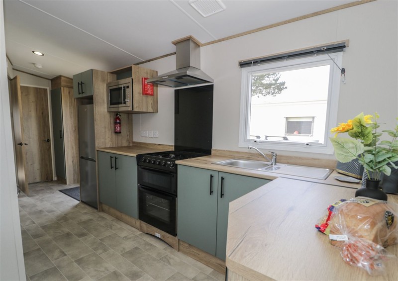 This is the kitchen at Puffin Way Holiday Caravan, Llwyngwril