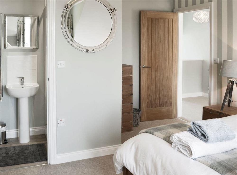 Beautifully decorated bedroom with en-suite at Puffins in Beadnell, near Alnwick, Northumberland