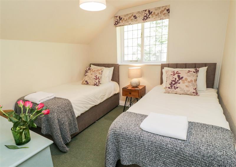 A bedroom in Pumphouse Cottage at Pumphouse Cottage, Uffculme