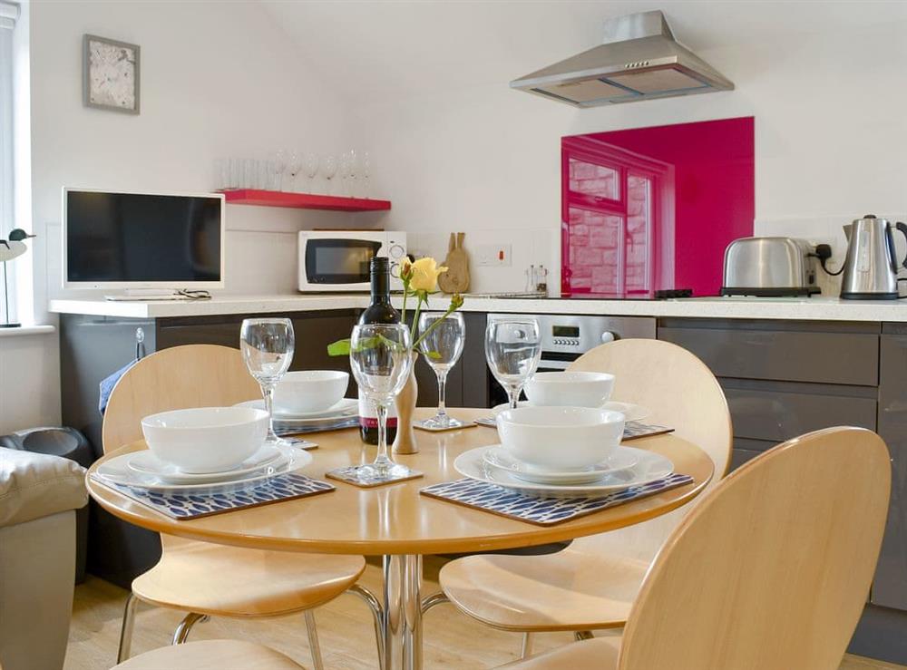Charming dining area at Purbeck Apartment in Chideock, Dorset