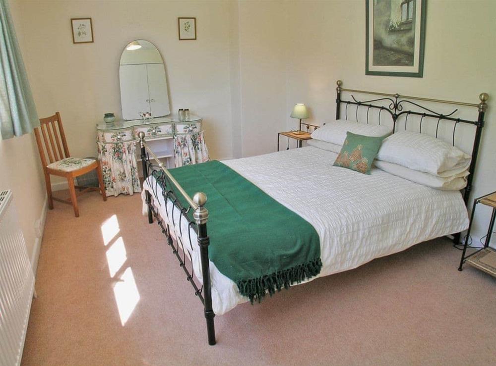 Double bedroom at Purcombe Farmhouse in Whitchurch Canonicorum, near Bridport, Dorset