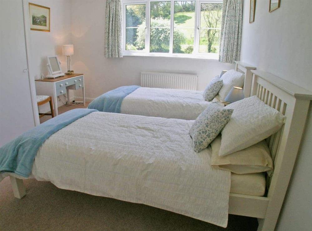 Twin bedroom at Purcombe Farmhouse in Whitchurch Canonicorum, near Bridport, Dorset