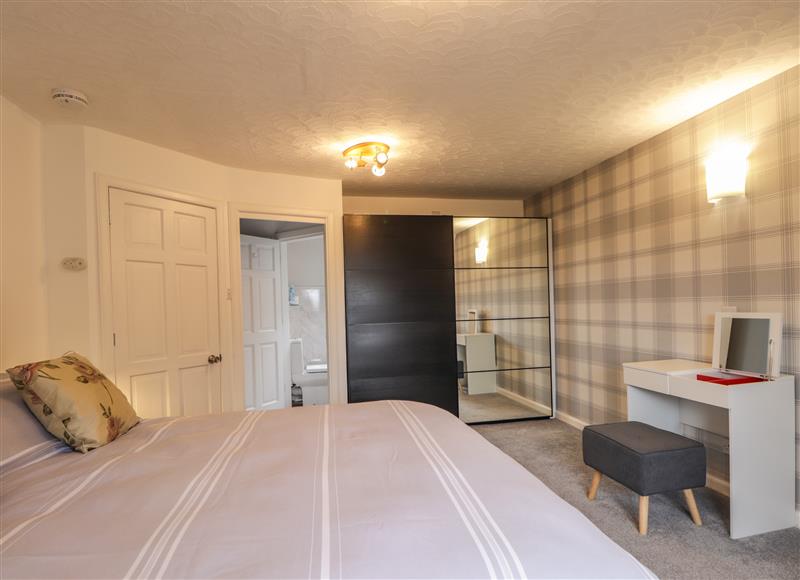 This is the bedroom at Purlie Lodge Apartment, Abriachan near Inverness