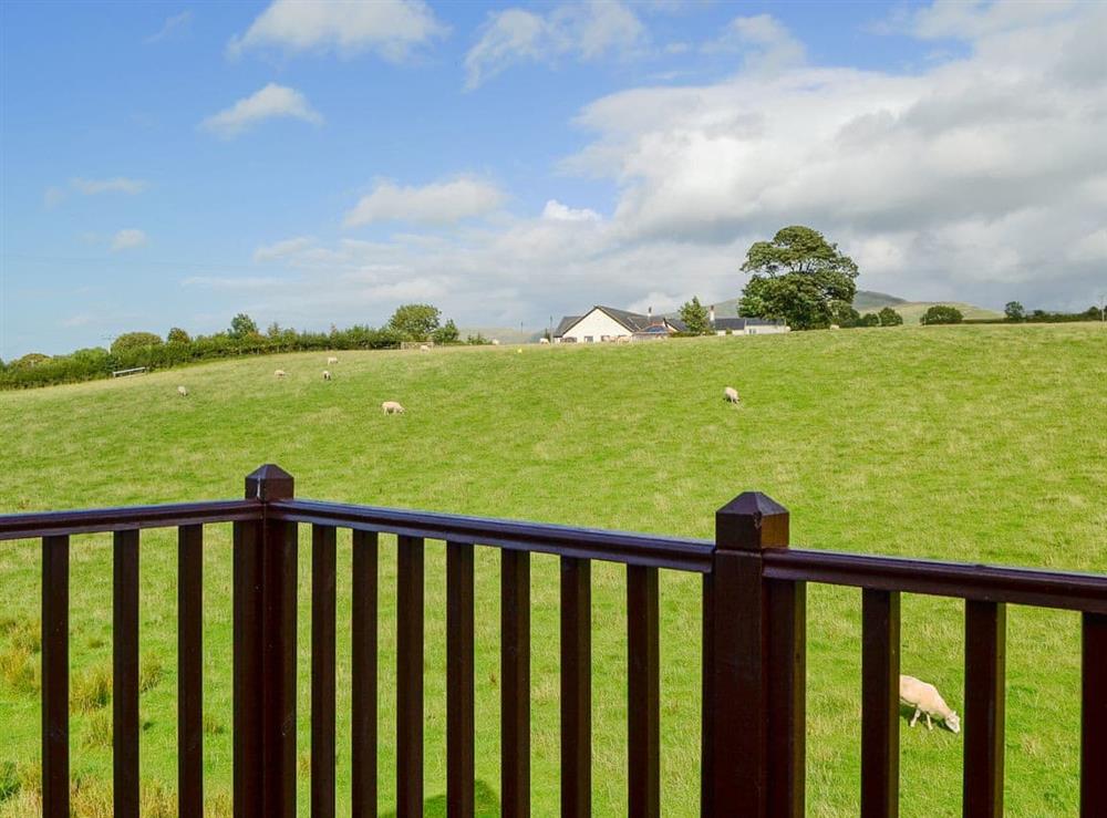 Private balcony with great views to the fields and fell tops at Pussywillow Cottage in Rowrah, near Cockermouth, Cumbria