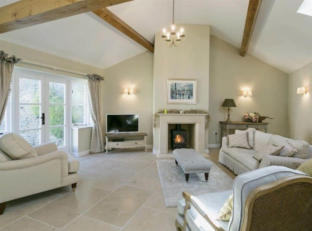Beautifully decorated living area with woodburner at Pye Cottage in Souldern, near Bicester, Oxfordshire