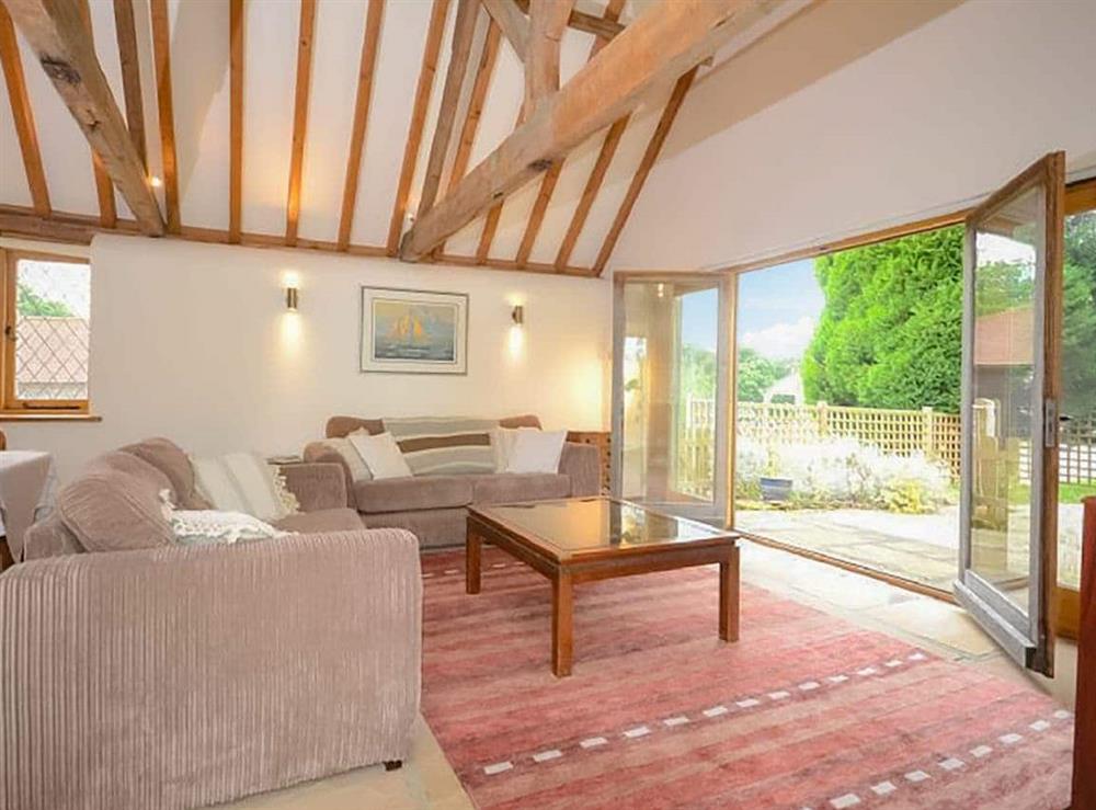 Relax in the living area at Quail Cottage in Cuckfield, West Sussex
