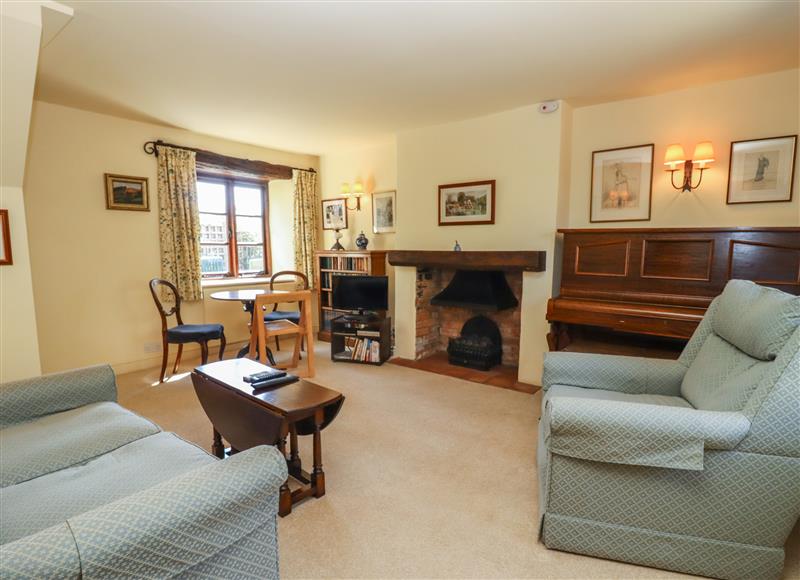 Relax in the living area at Quaker Cottage, Milton-Under-Wychwood