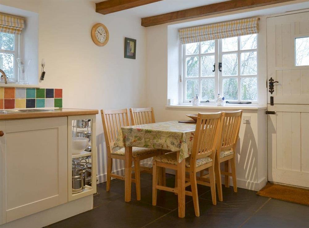 Convenient dining area within kitchen at Quarrymans Cottage in Golberdon, Nr Callington, Cornwall., Great Britain