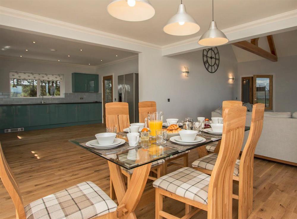 Appealing dining area with wonderful views at Quarter Acre House in Kirkcolm, near Stranraer, Dumfries and Galloway, Wigtownshire