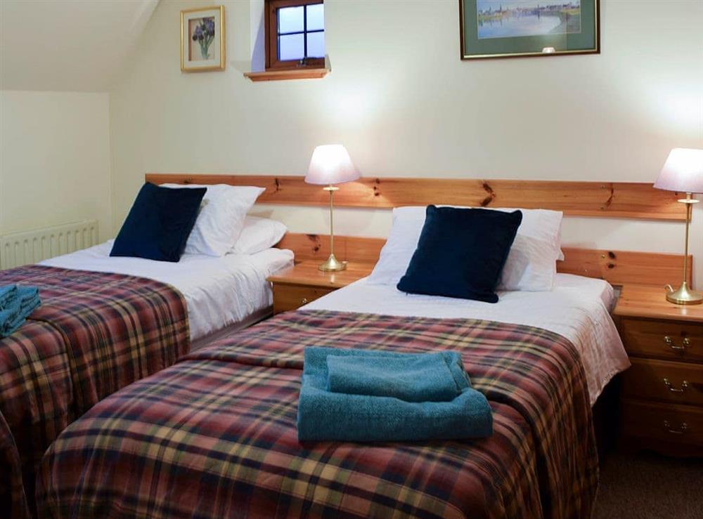 Twin bedroom at Quarter Deck Gardens in Glencoe, Argyll