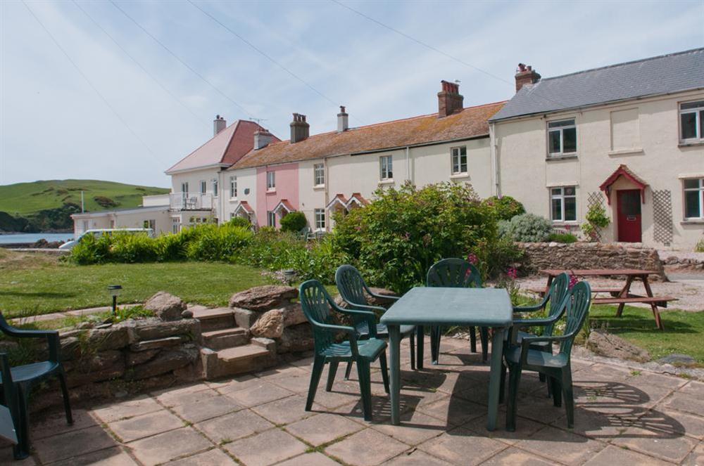 Dine alfresco on the terrace, close to the beach at Quay Cottage in Hope Cove, Nr Kingsbridge
