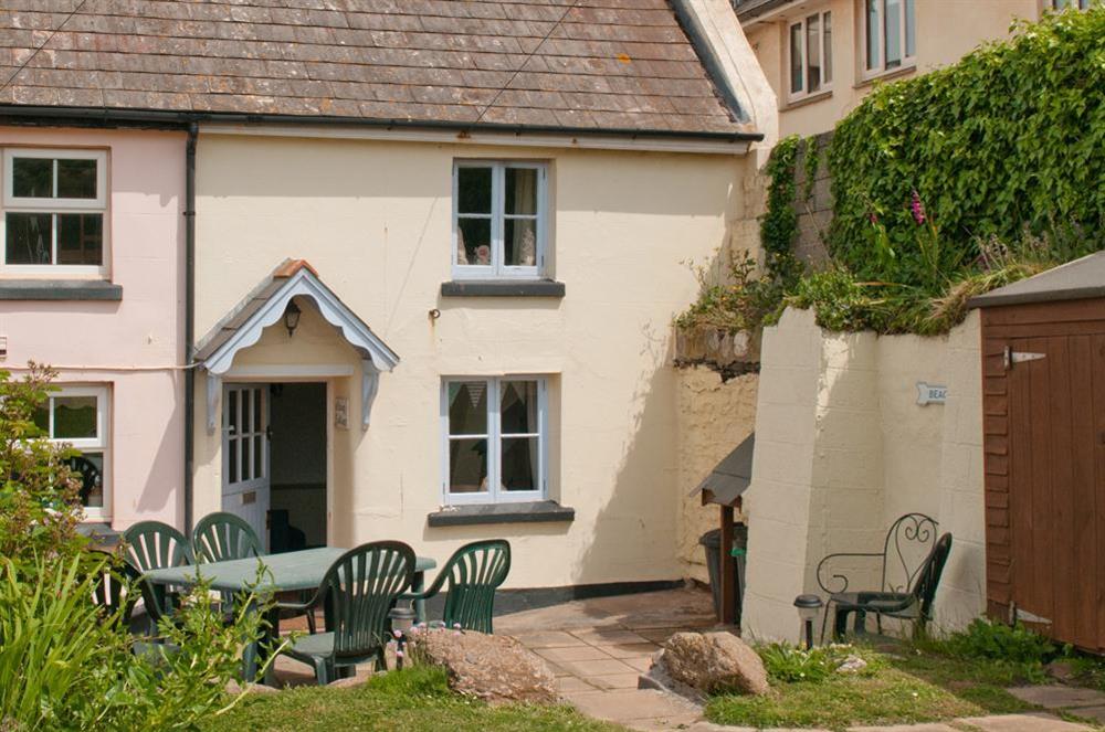 Quay Cottage has a small patio with table and chairs at Quay Cottage in Hope Cove, Nr Kingsbridge