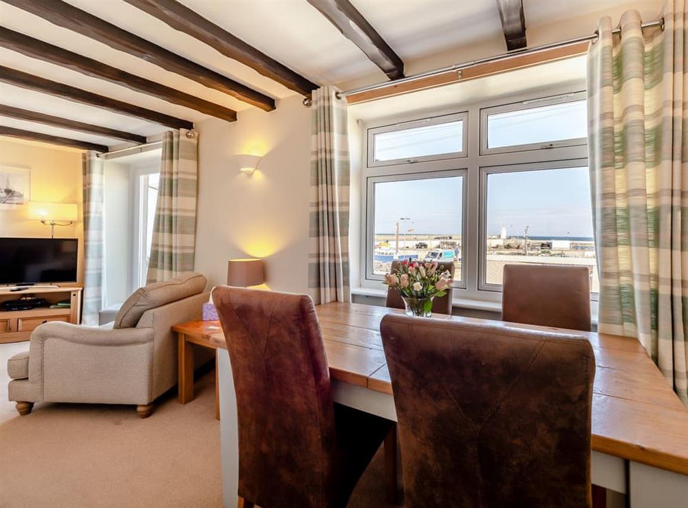 Dining Area at Quay Cottage in Seahouses, near Alnwick, Northumberland, England