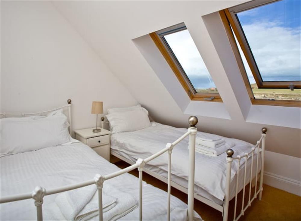 Twin bedroom at Quay House in Porth Beach, Newquay