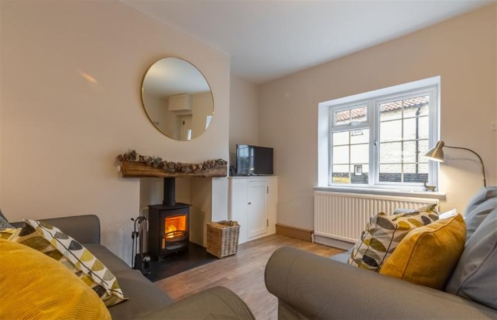 Ground floor: Light the wood burning stove and take a seat at Quay View Cottage, Wells-next-the-Sea