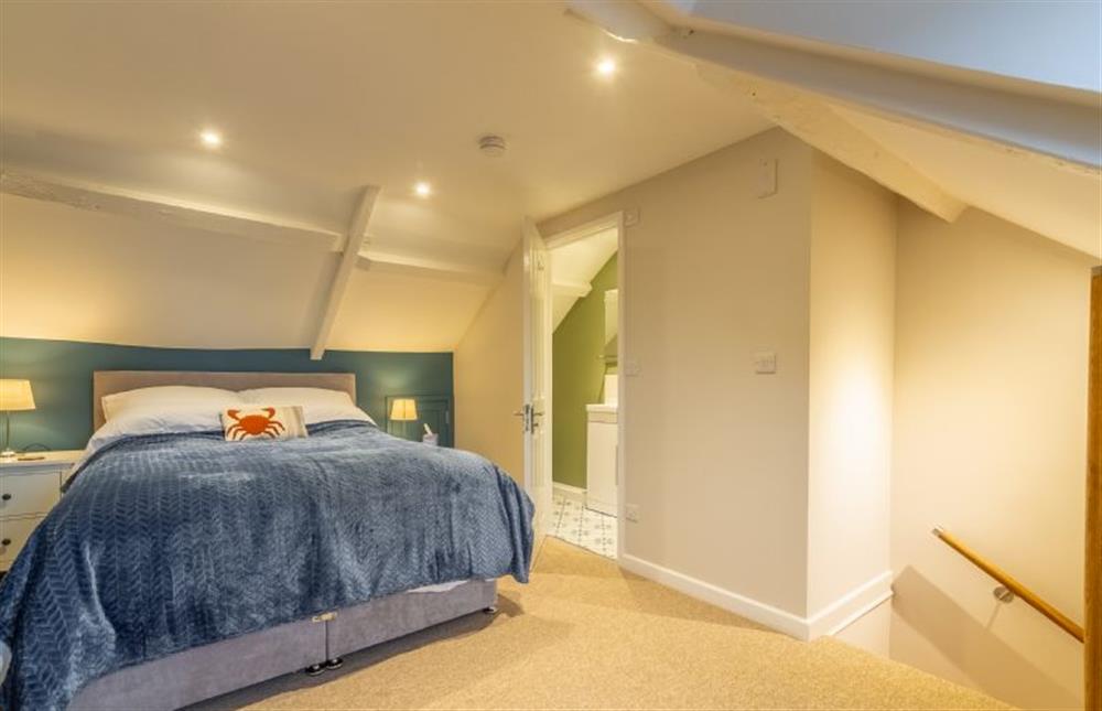 Second floor: Master bedroom with en-suite shower room at Quay View Cottage, Wells-next-the-Sea