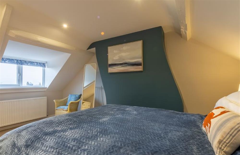 Second floor: Master bedroom with view to the coast at Quay View Cottage, Wells-next-the-Sea