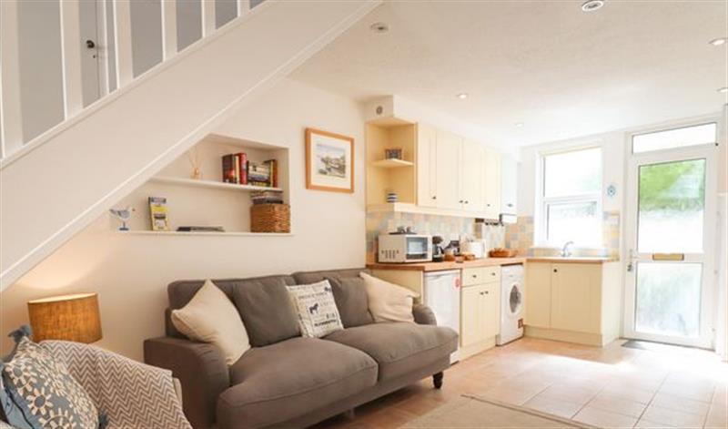 Relax in the living area at Quayside Cottage, Teignmouth