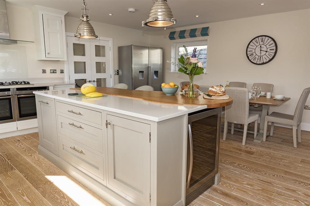 Kitchen with granite work surfaces and range of Neff appliances at Quayside in , Salcombe