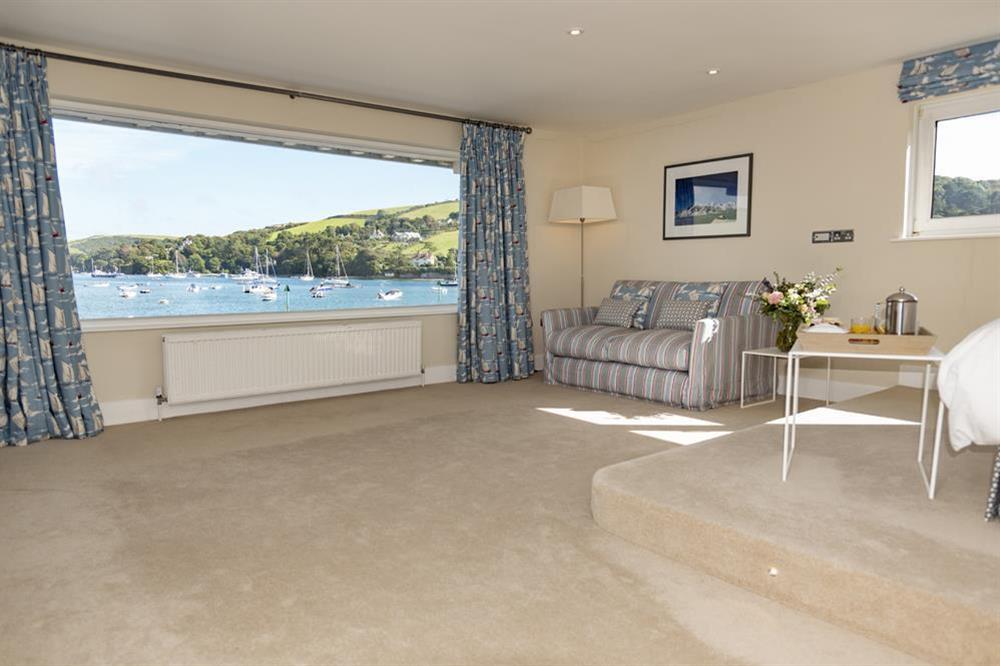 Superb en suite master bedroom with wonderful views across the water from the raised super-King size bed (photo 2) at Quayside in , Salcombe