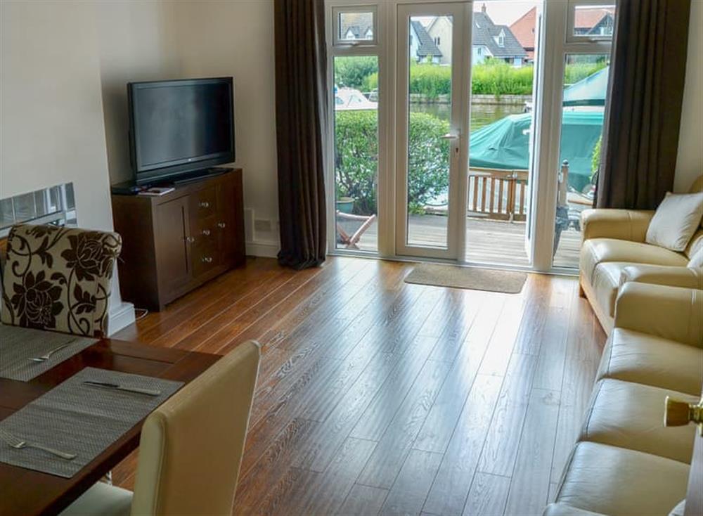 Comfortably furnished living/dining room at Quayside in Wroxham, Norfolk