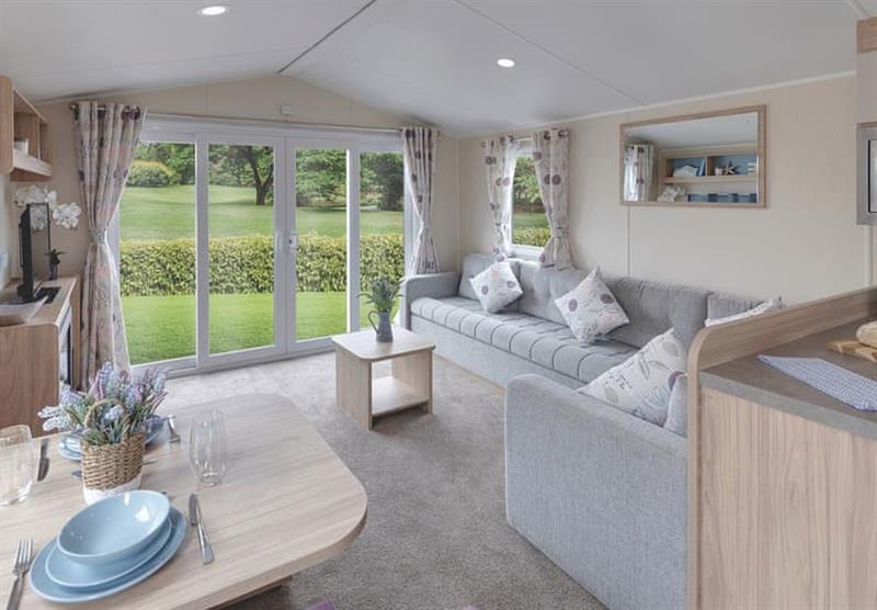 The living room in a Superior Caravan 2 at Queensberry Bay Leisure Park in Annan, Dumfries & Galloway