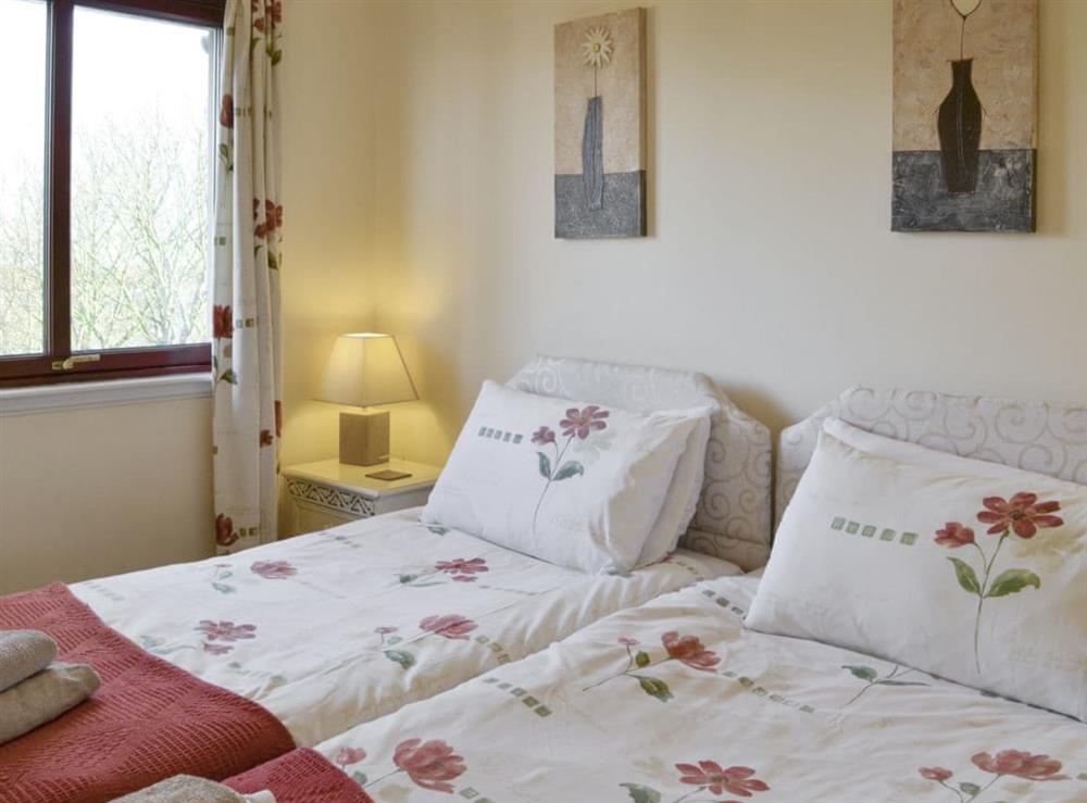 Relaxing twin bedroom at Queenshill in Edinburgh, Midlothian
