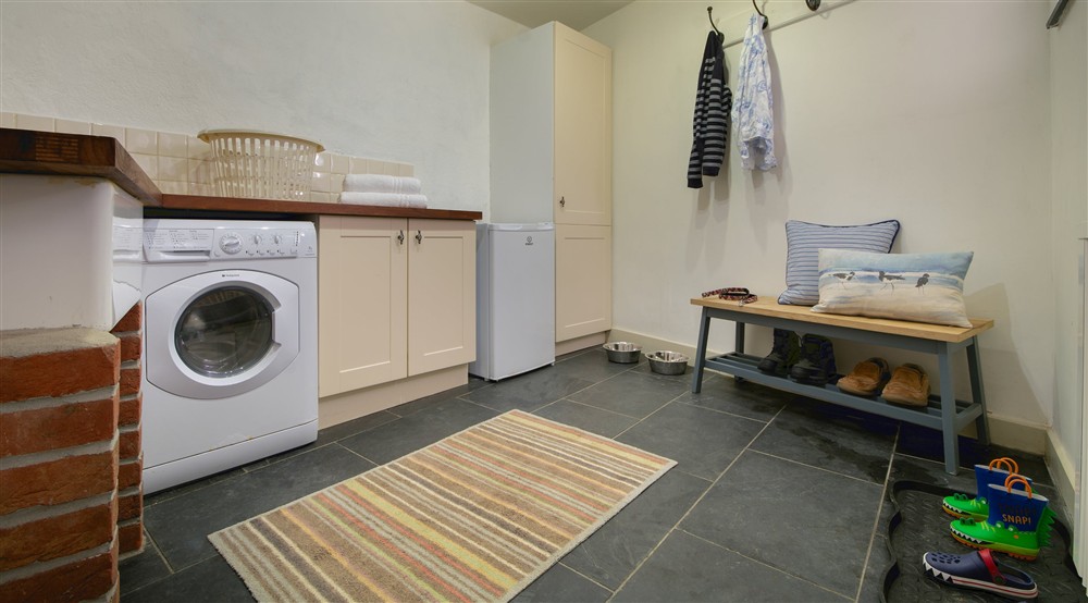 The utility and boot room at Quin Cottage in Port Quin, Cornwall