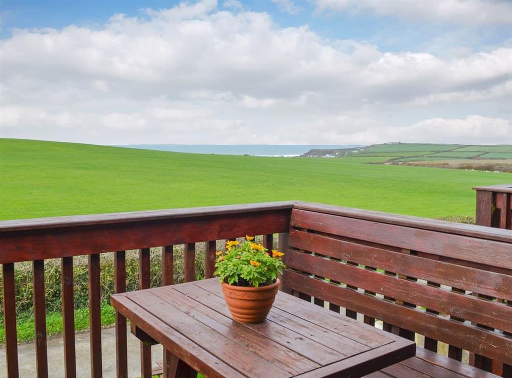 Decking with wonderful sea views at Barn Cottage, 